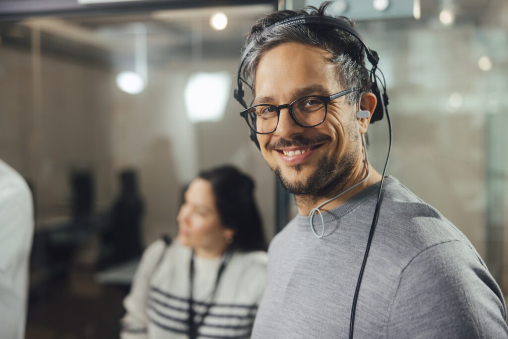 Christian Martin Schäfer with headphones during an office shoot