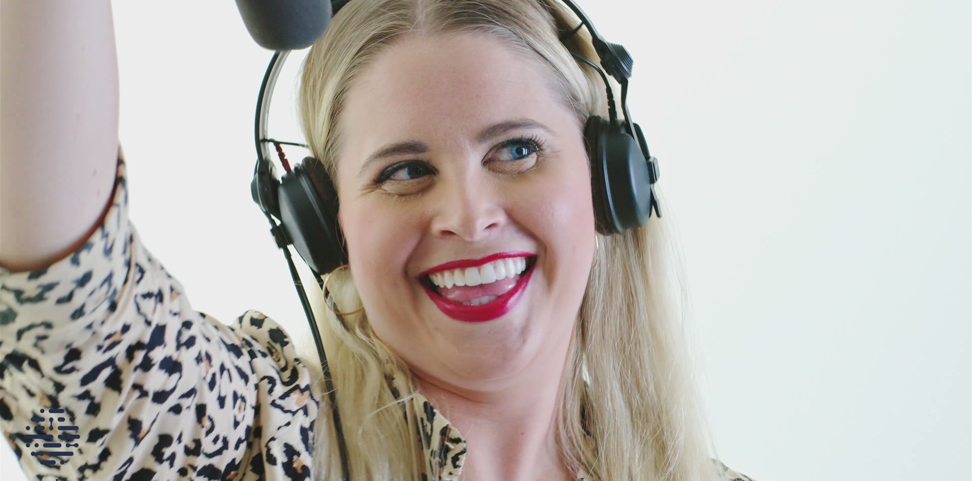 Smiling employee wearing headphones, Ada Health recruitment video